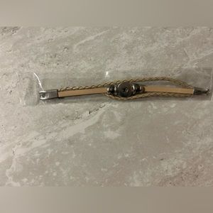 Leather style tan bracelets with silver details.
